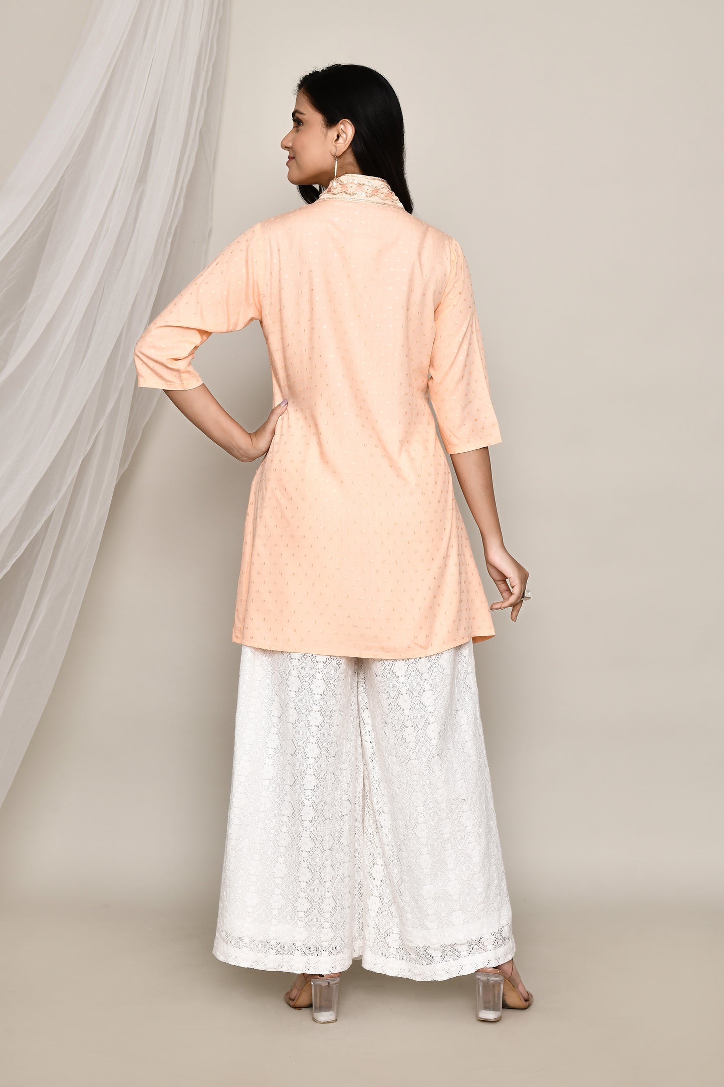 V- Neck Short Fancy Kurti With Neck Embroidery In Pastel Colour Palate